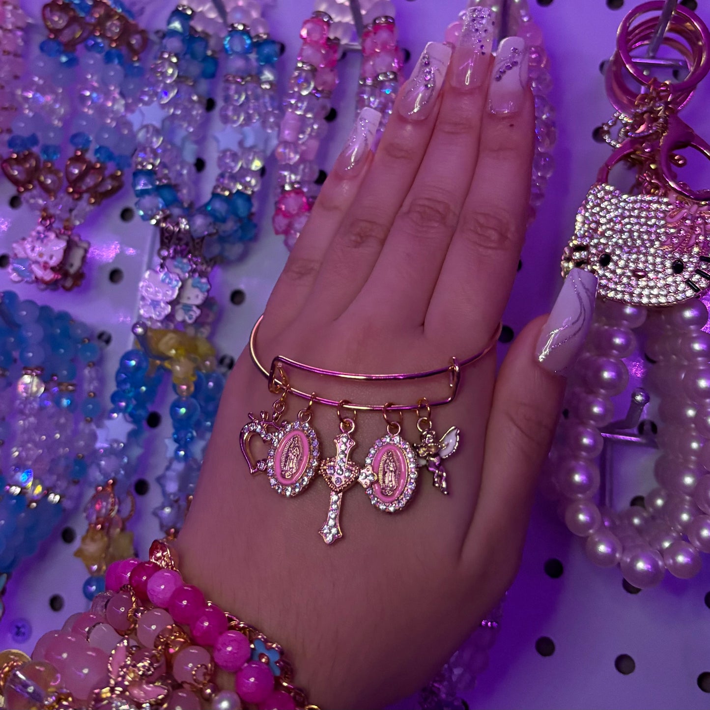 Cross with Pink Virgin Mary’s